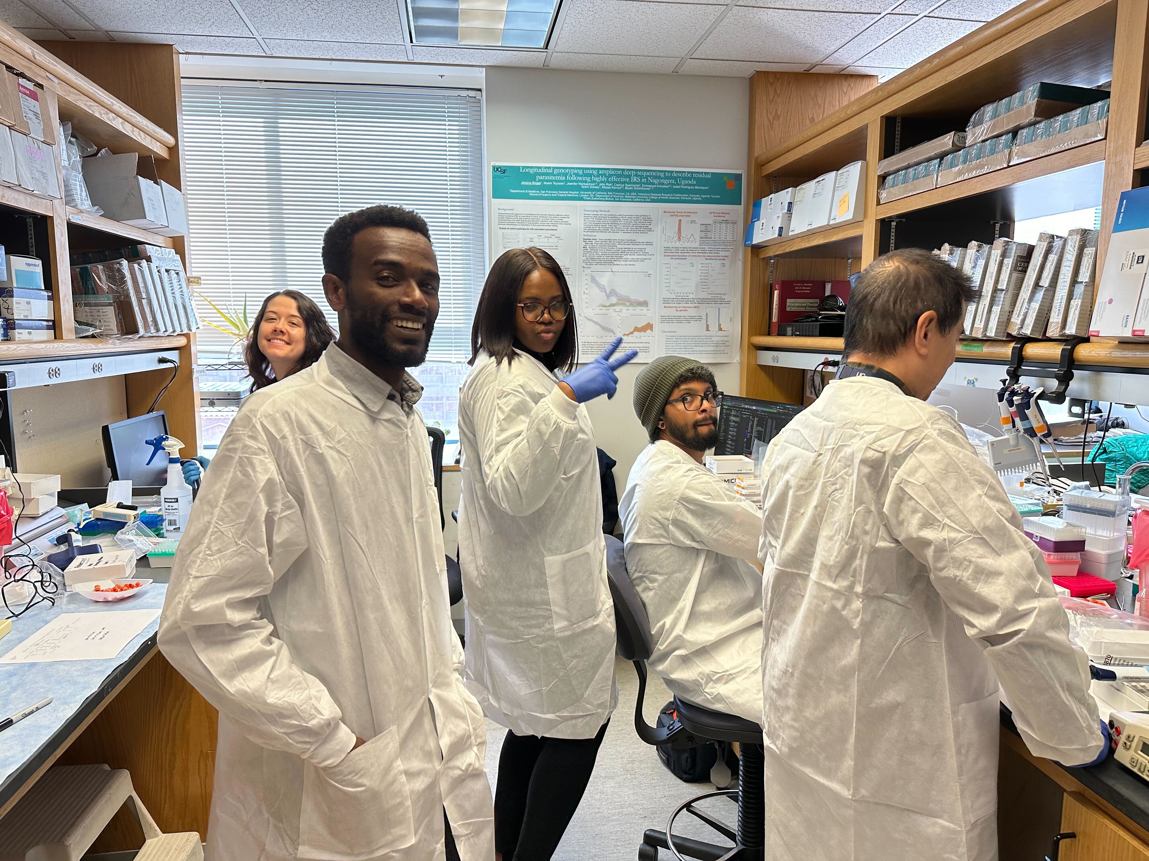 Lab members working on bench